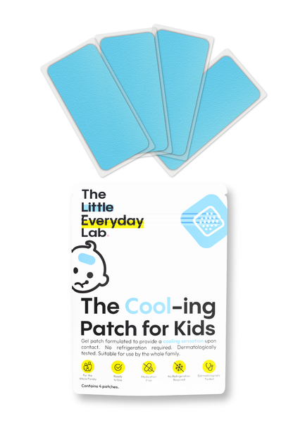 Child applying a Cool-ing Patch for Kids on the forehead to cool down